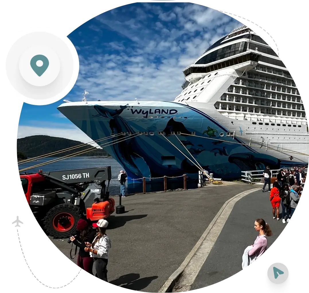 People walking near a large cruise ship